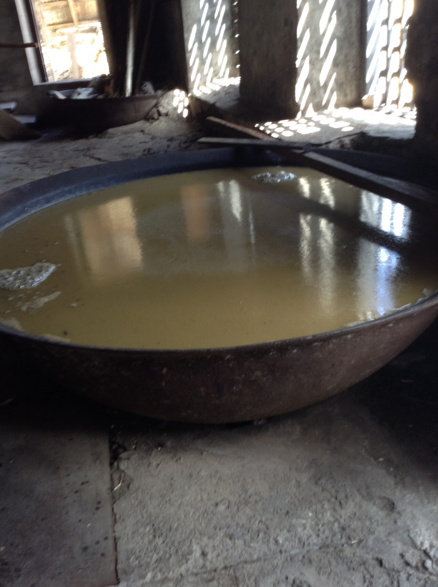 Cane juice fermenting in a vat