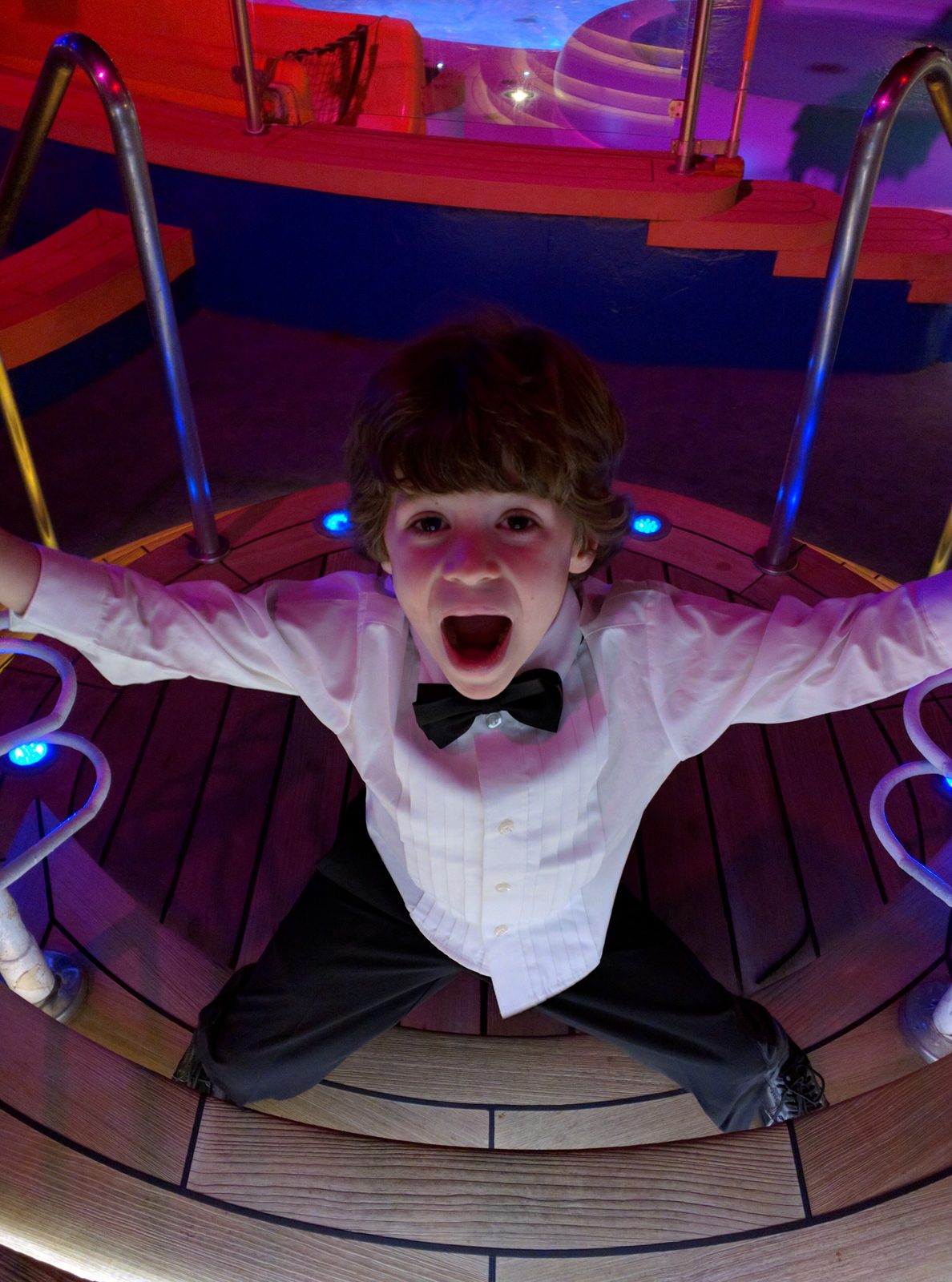 Thomas playing on the glowing deck at night