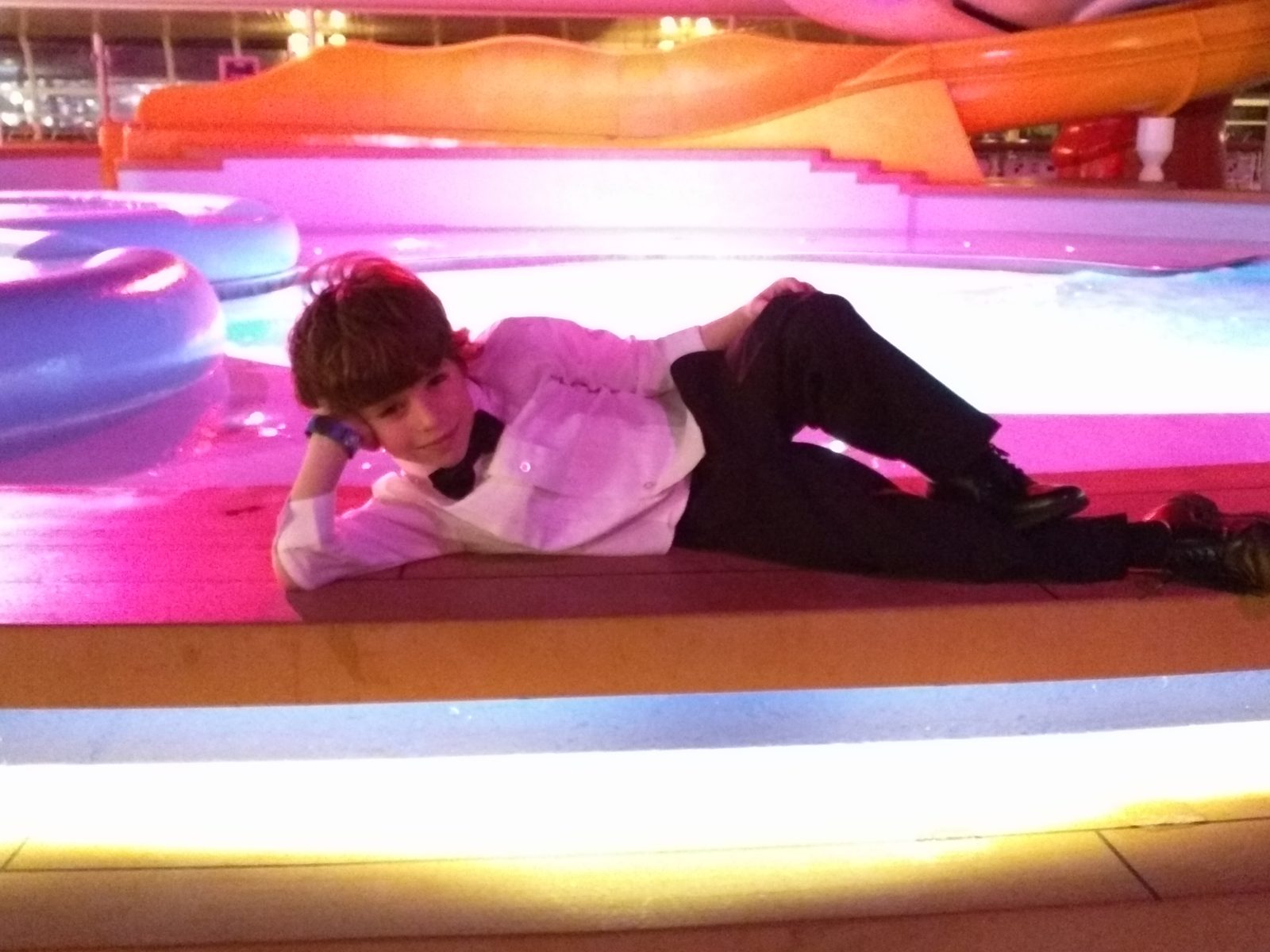Thomas, still in his tuxedo on the pool deck