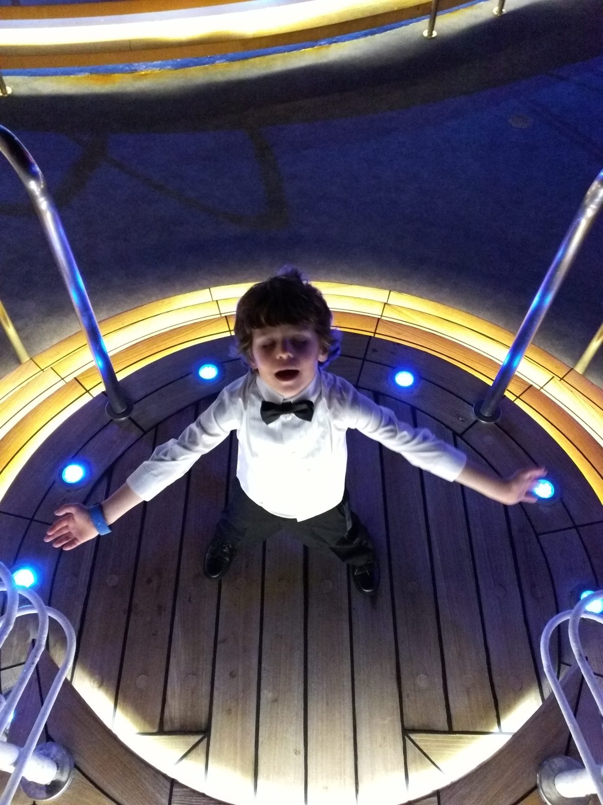 Thomas stretched out on the glowing pool deck