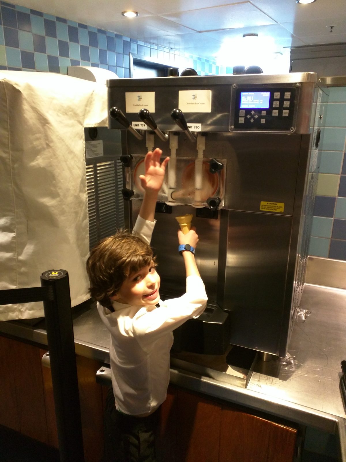 Thomas reaching for the soft-serve machine