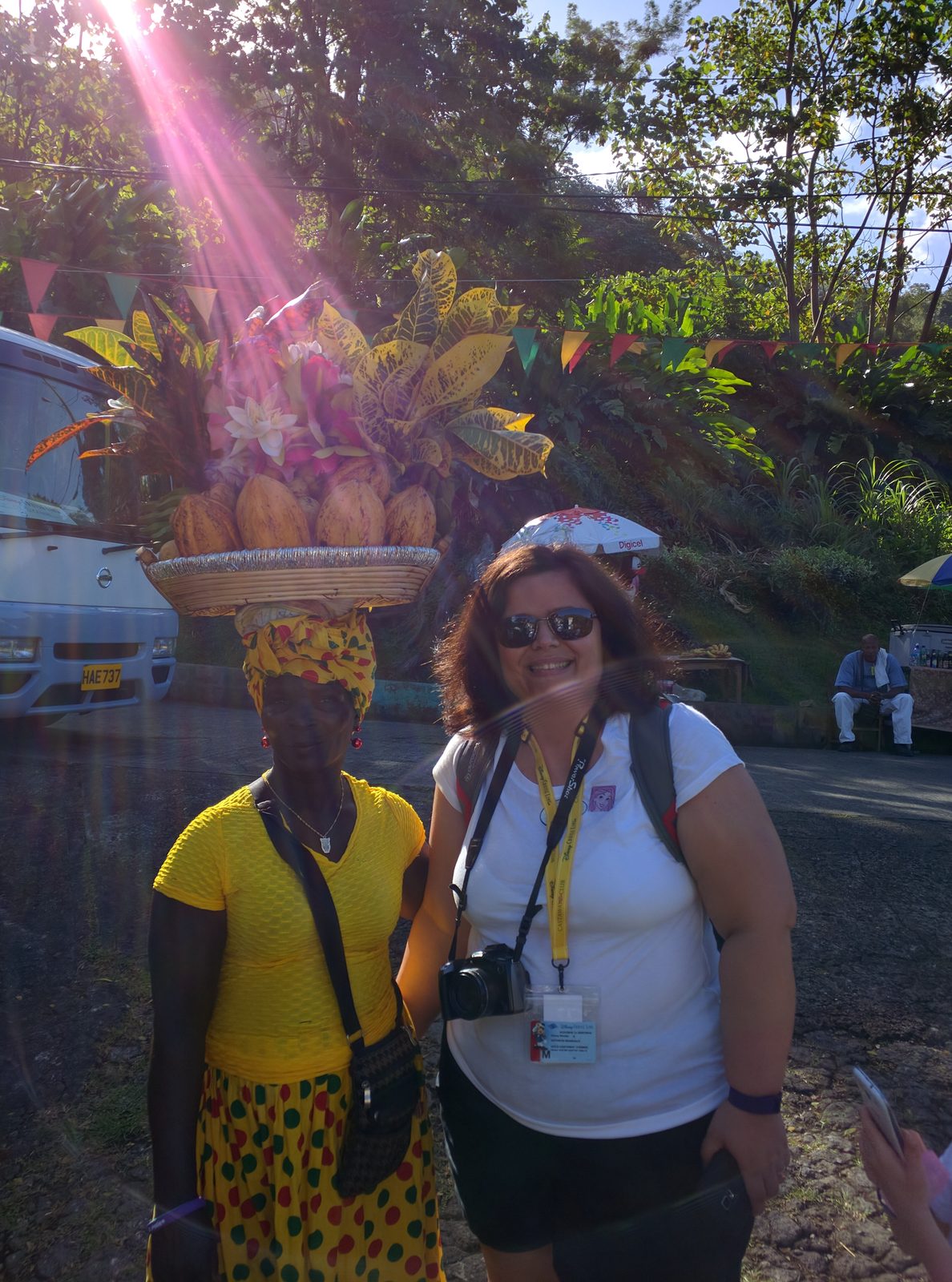 Kathy with a fruit seller at Annandale Falls