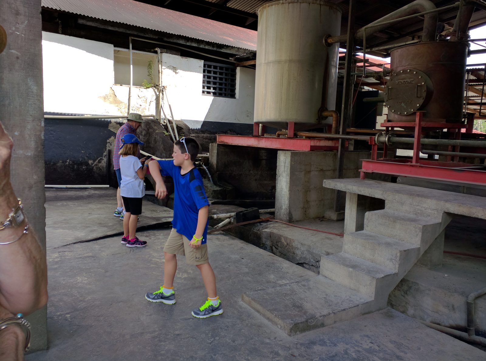 Thomas working the old cane press