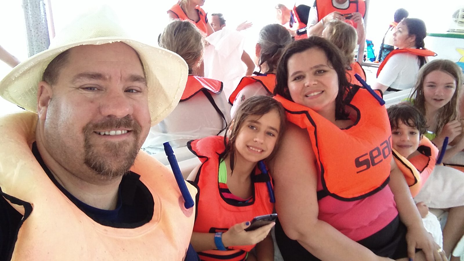 Life vests on before the boat