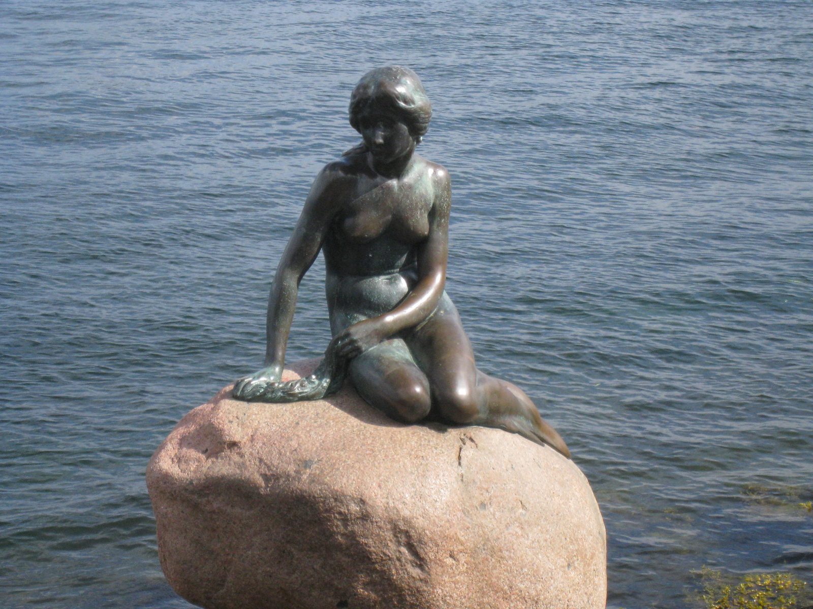 The Little Mermaid on her rock in the harbor