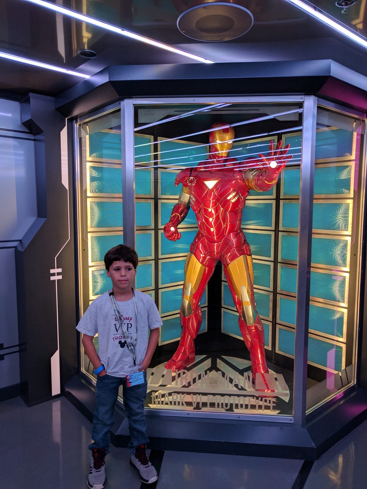 Thomas beside the Iron Man statue on board