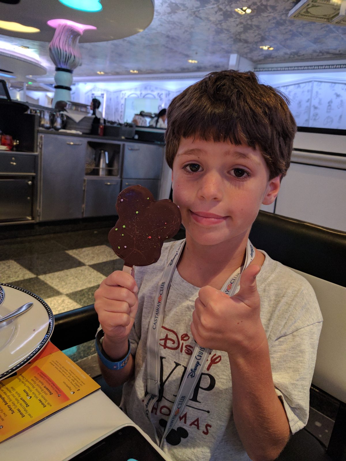 Thomas gives the Mickey chocolate treat a thumbs up