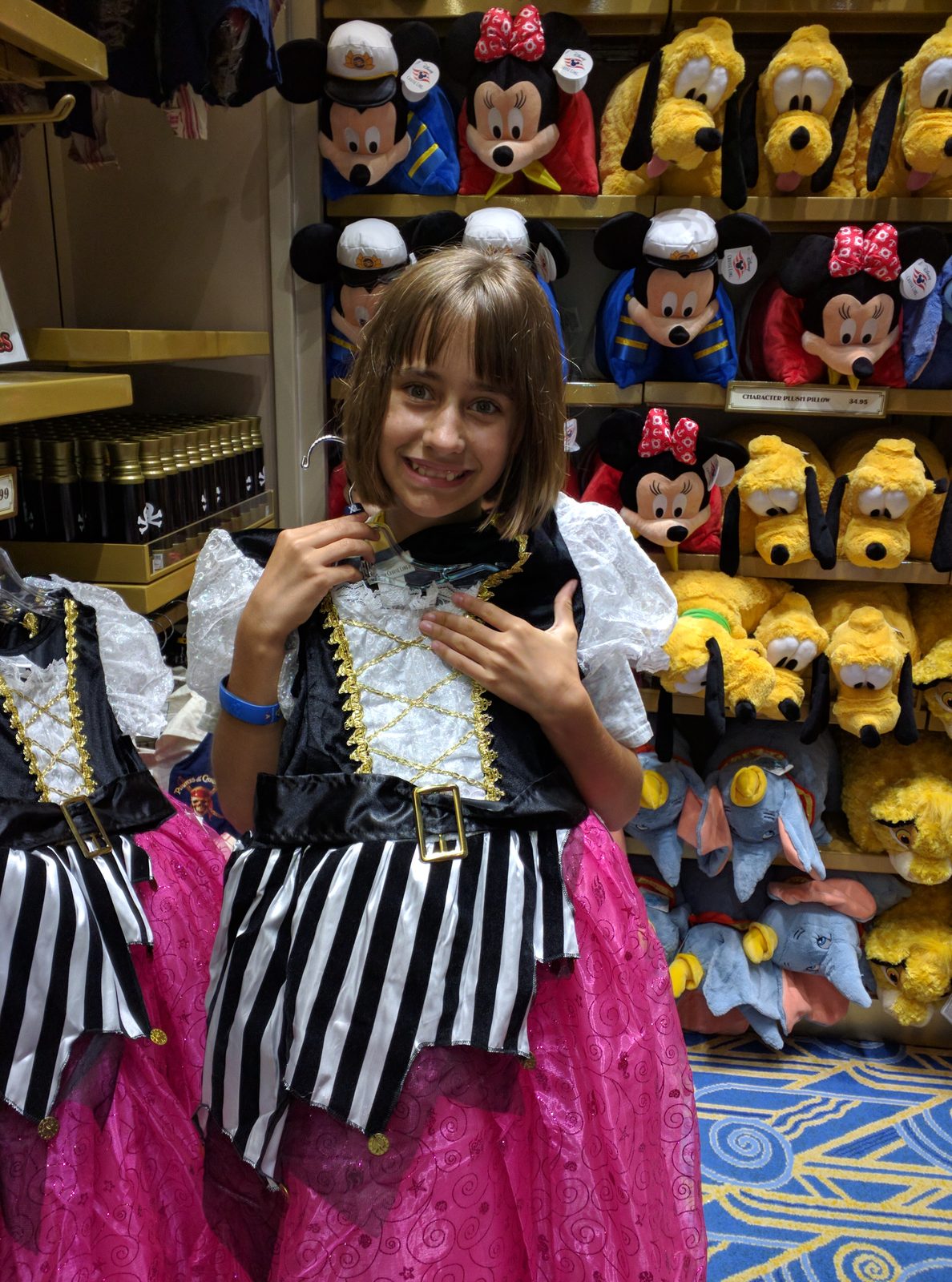 Lisa playing dress up as a pirate in the shop