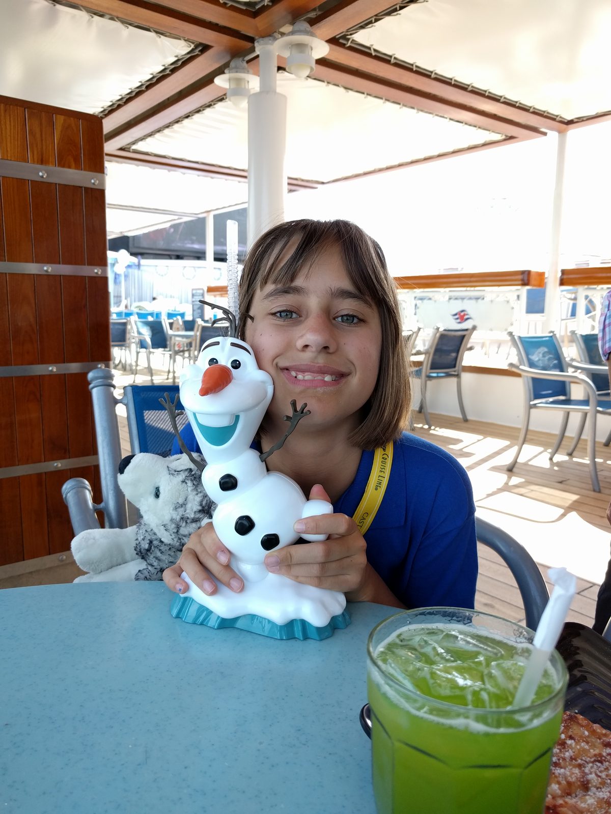 Lisa back aboard, hugging her new Olaf