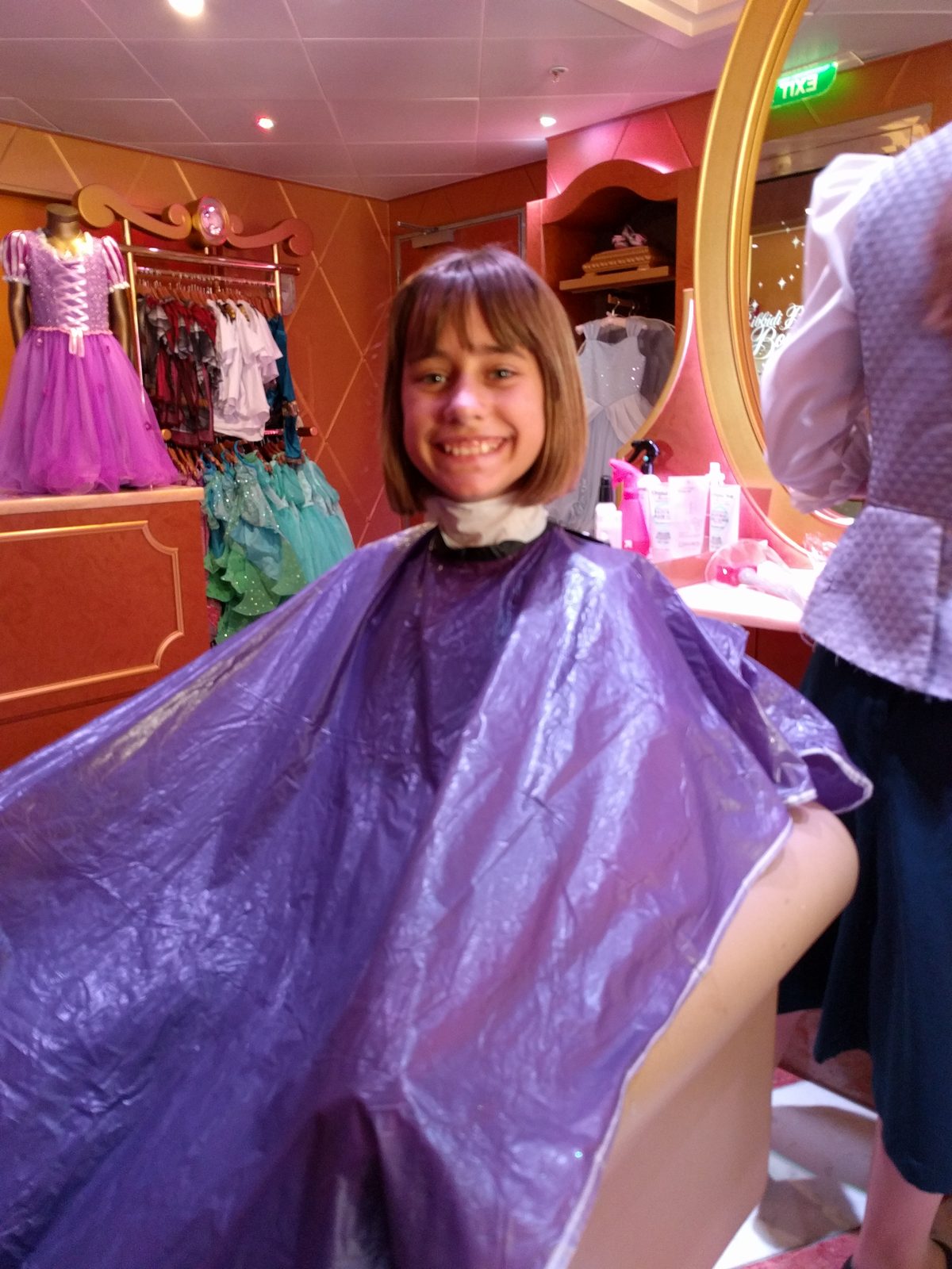 Lisa in the Bibbidi Bobbidi Boutique chair
