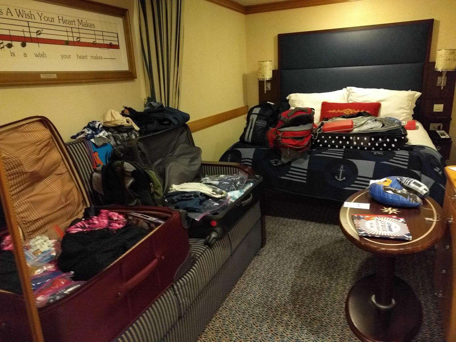 Packing suitcases in the stateroom for tomorrow