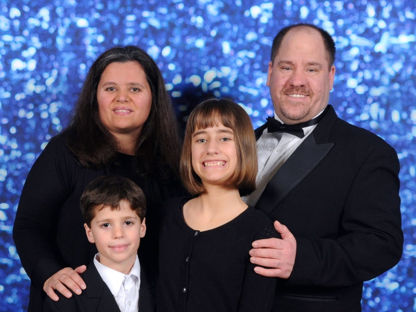 Formal night portrait, matching black outfits