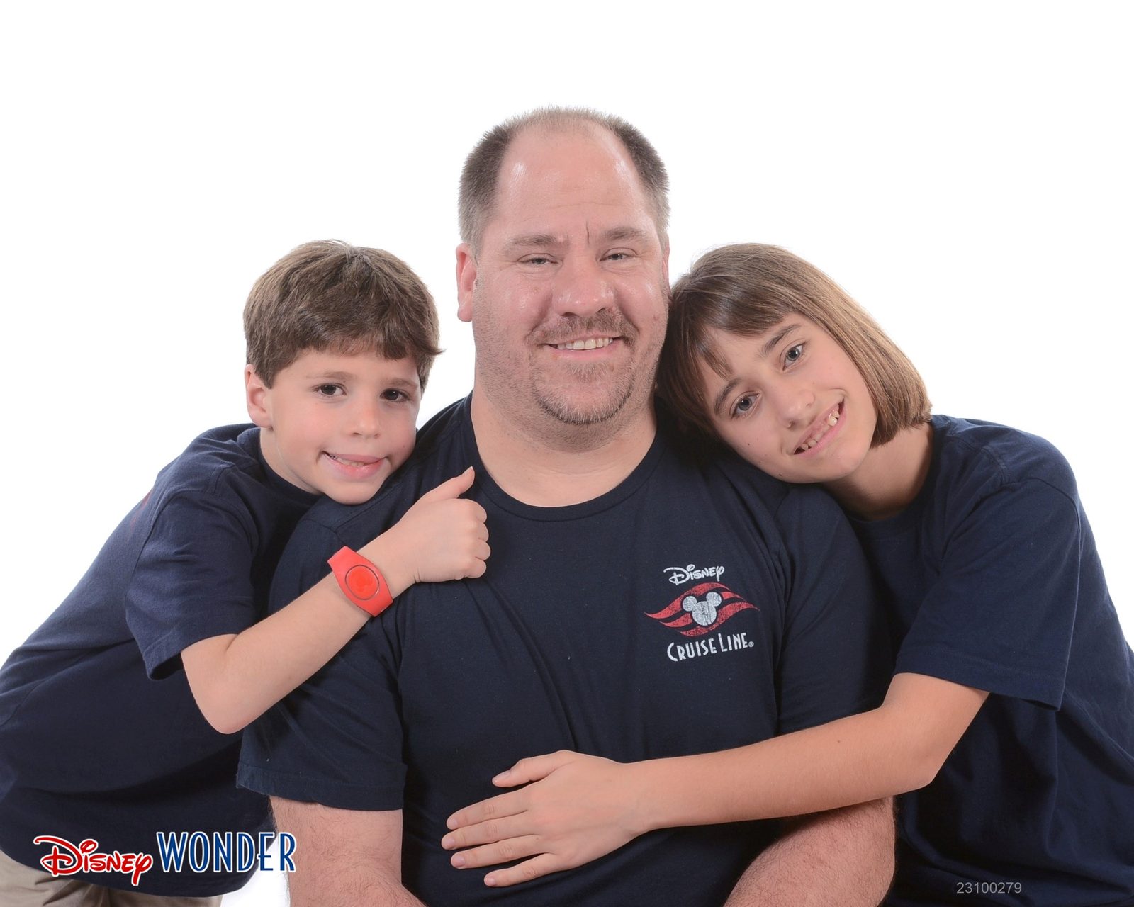Thomas, Michael and Lisa leaning in for a Wonder portrait
