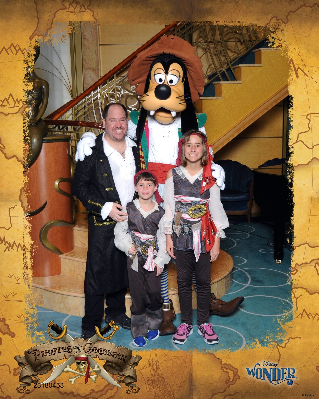 Michael, Thomas, Goofy in pirate garb and Lisa on Pirate Night