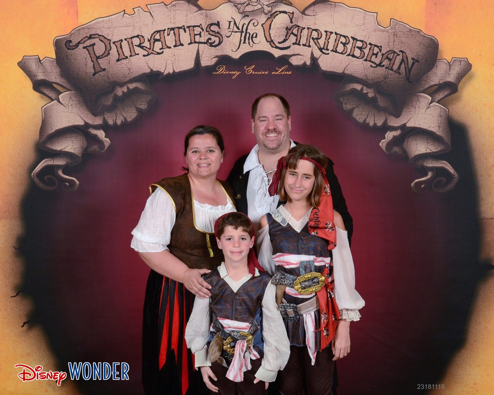 The four of us at the Pirates in the Caribbean backdrop
