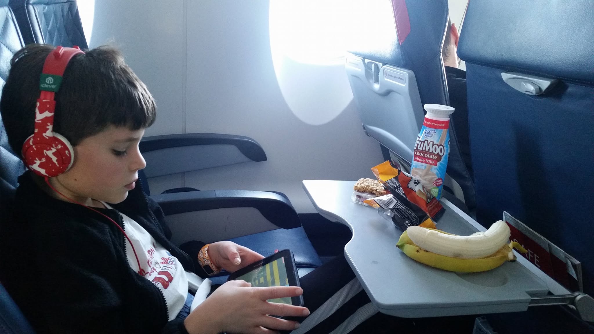 Thomas in Comfort Plus with all of the snacks
