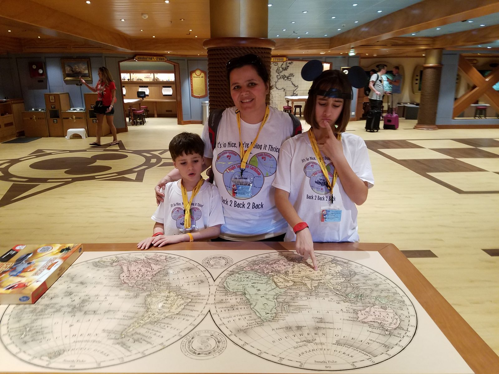 Kathy, Lisa and Thomas at the world map table