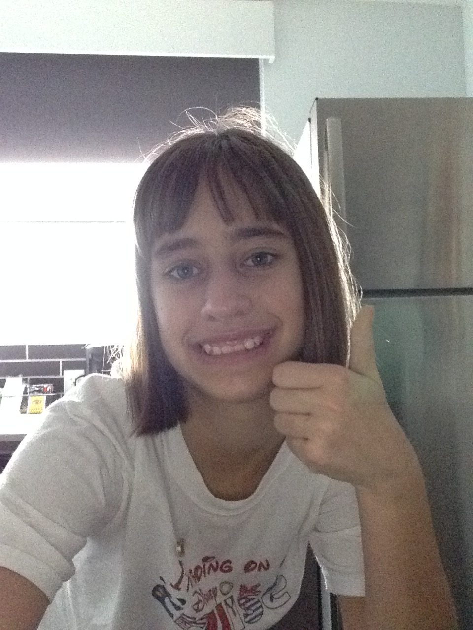 Lisa's thumbs-up selfie in San Juan