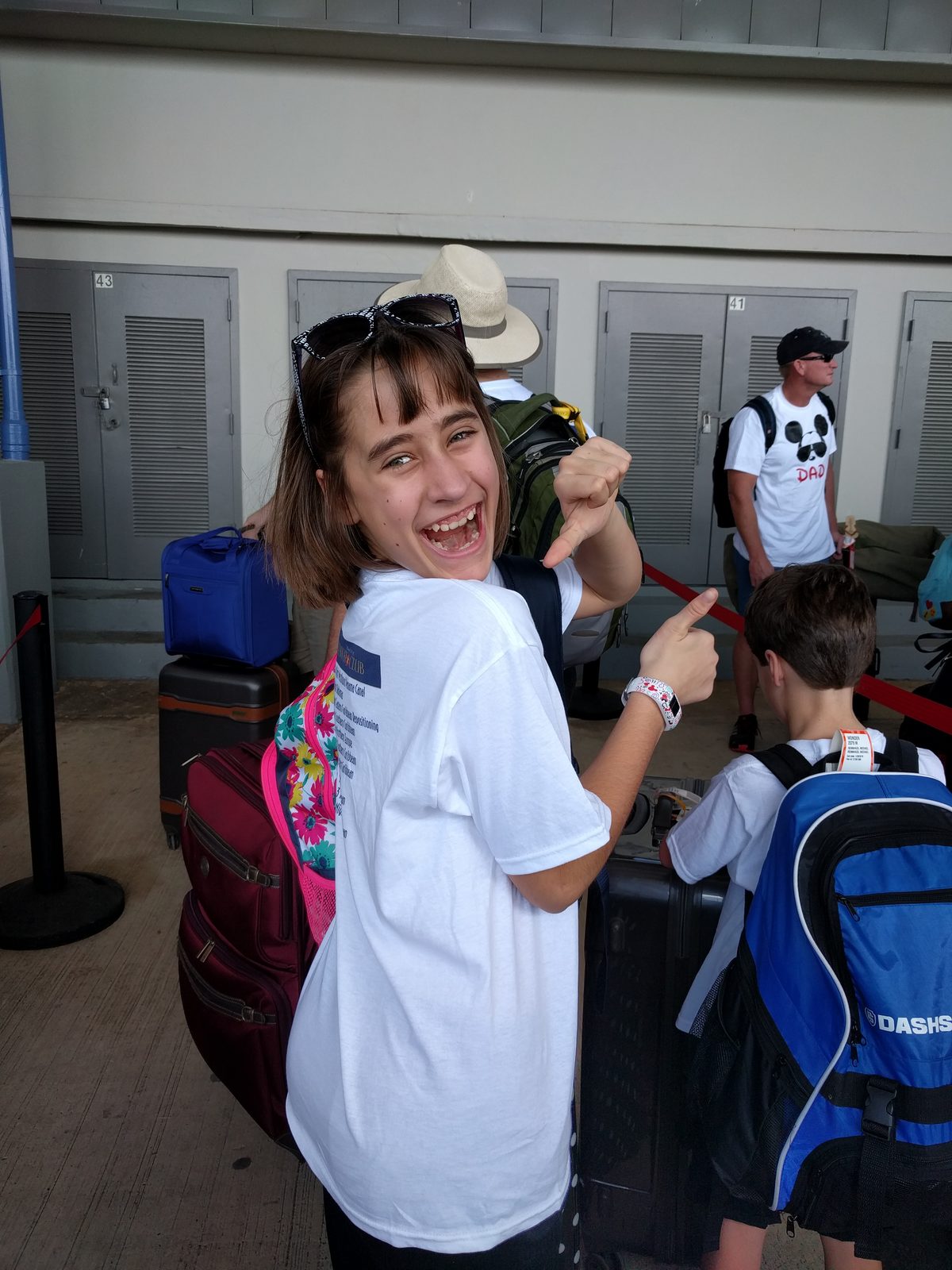 Lisa with our luggage at the cruise terminal in San Juan