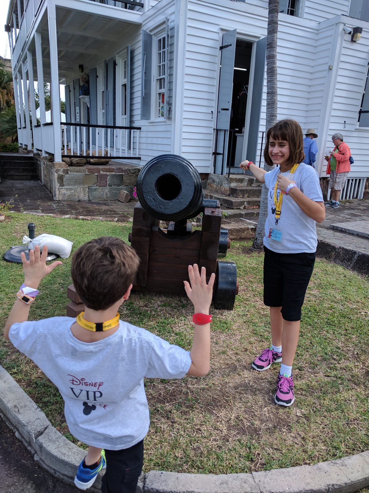 Kids by the cannon at the dockyard