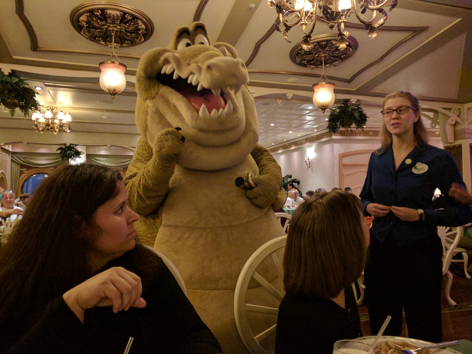 Louis the alligator works the room on formal night