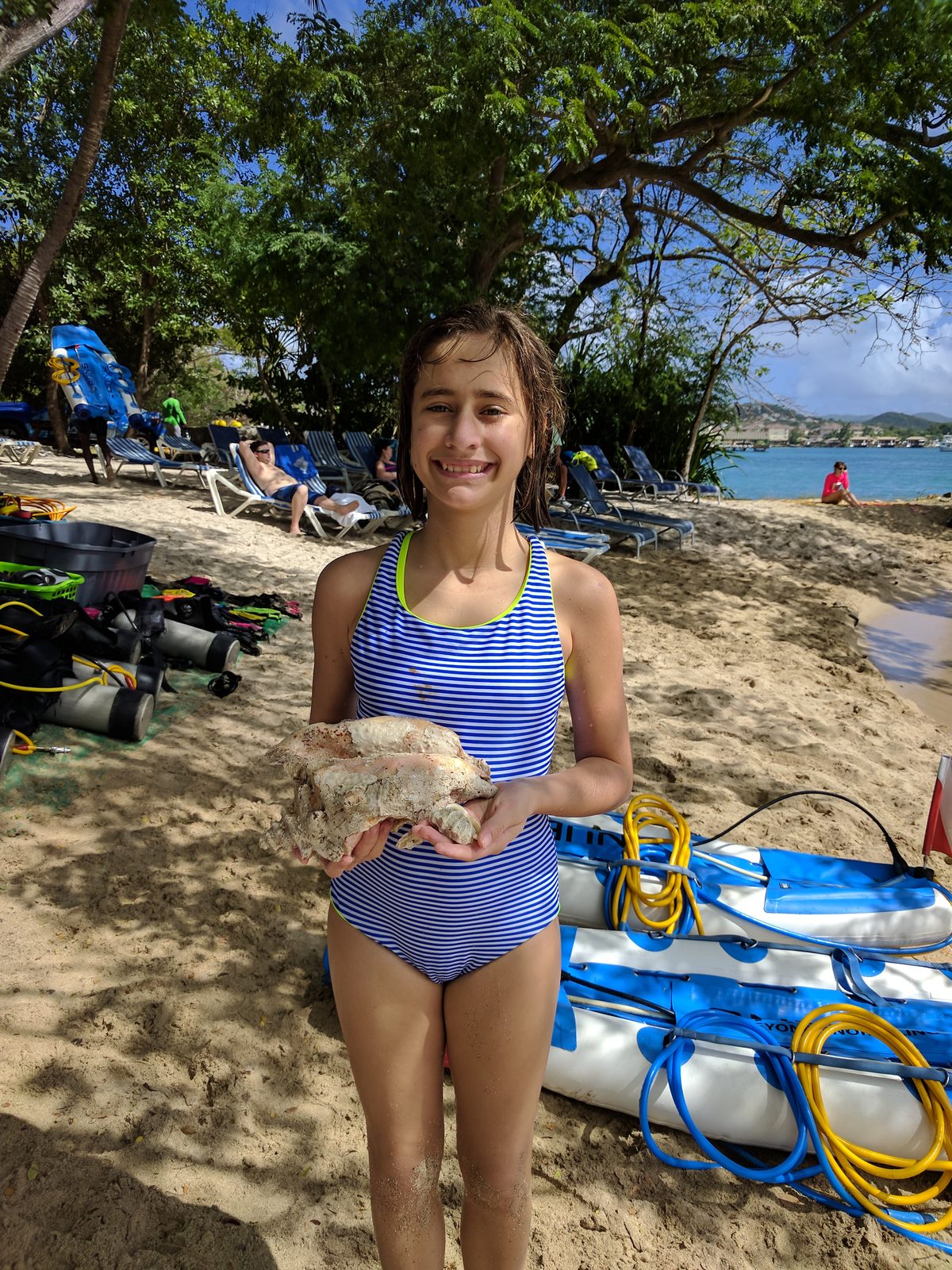 Lisa with the conch shell she found at Pigeon Island