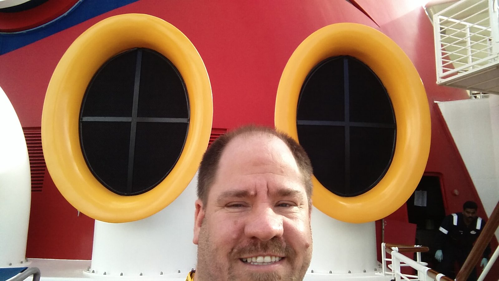 Between the giant Mickey ears on deck