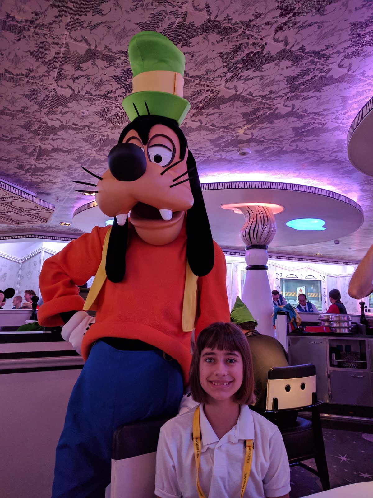 Goofy and Lisa at breakfast on the Wonder