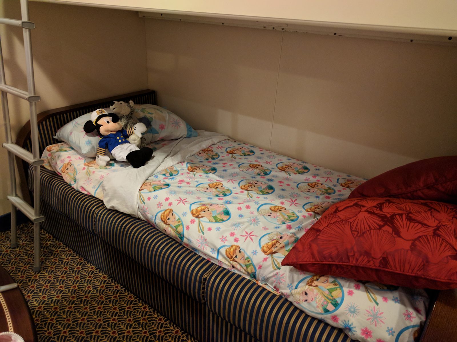 Lisa's Frozen sheets and a Mickey plush in our stateroom