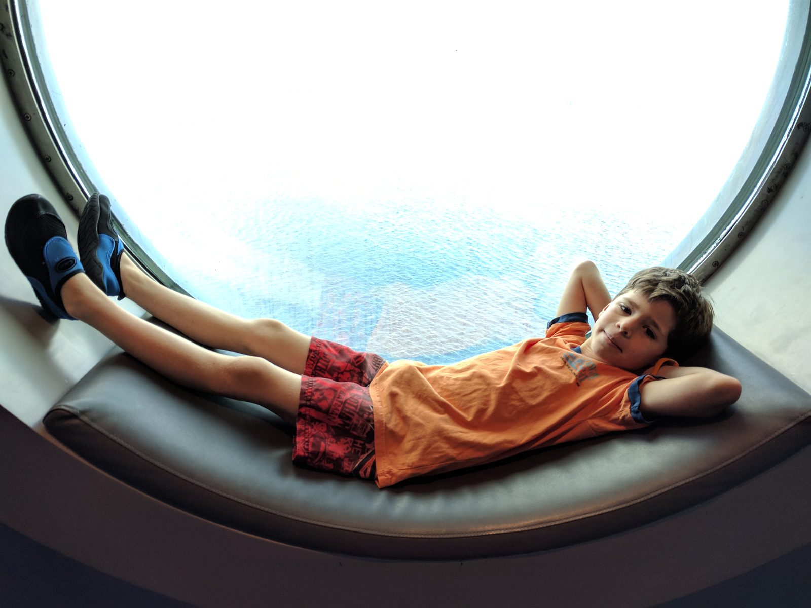 Thomas lounging in the porthole window on the Wonder