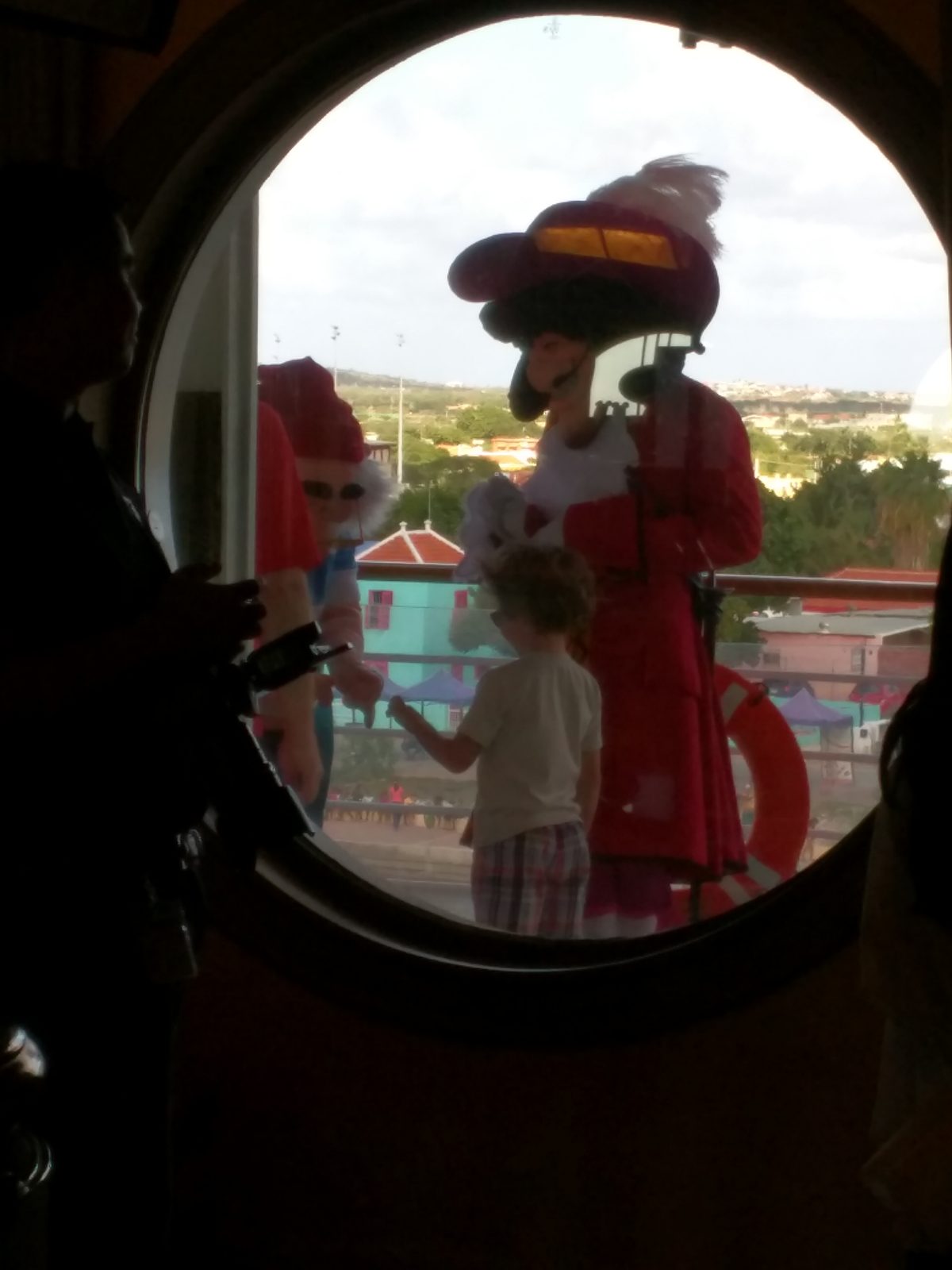 Captain Hook glimpsed through a porthole