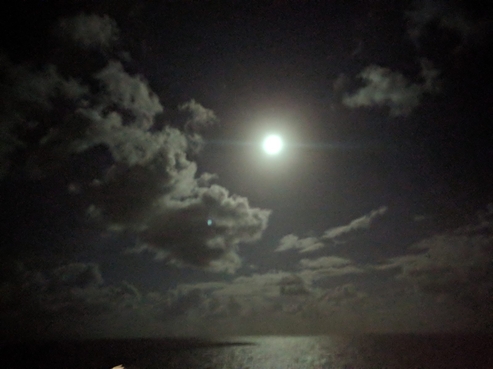 Moonrise over the water