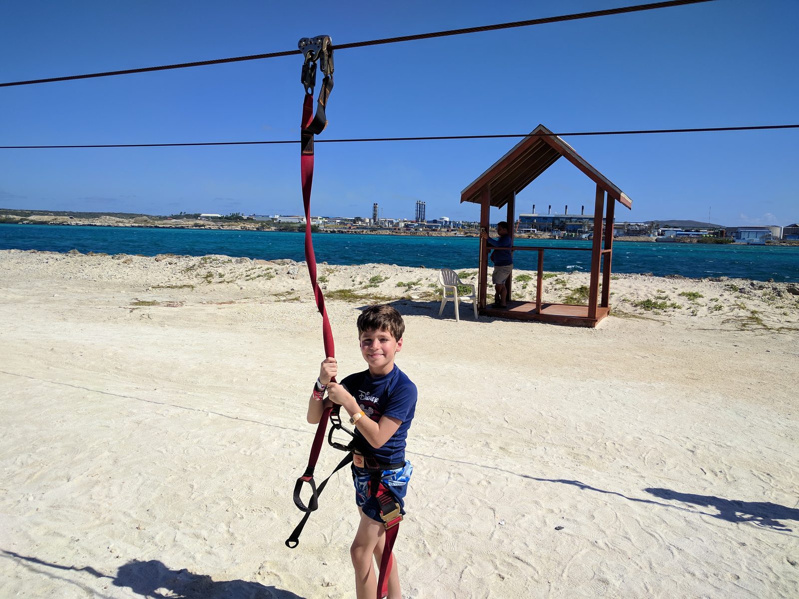 Thomas on the zip line at De Palm Island
