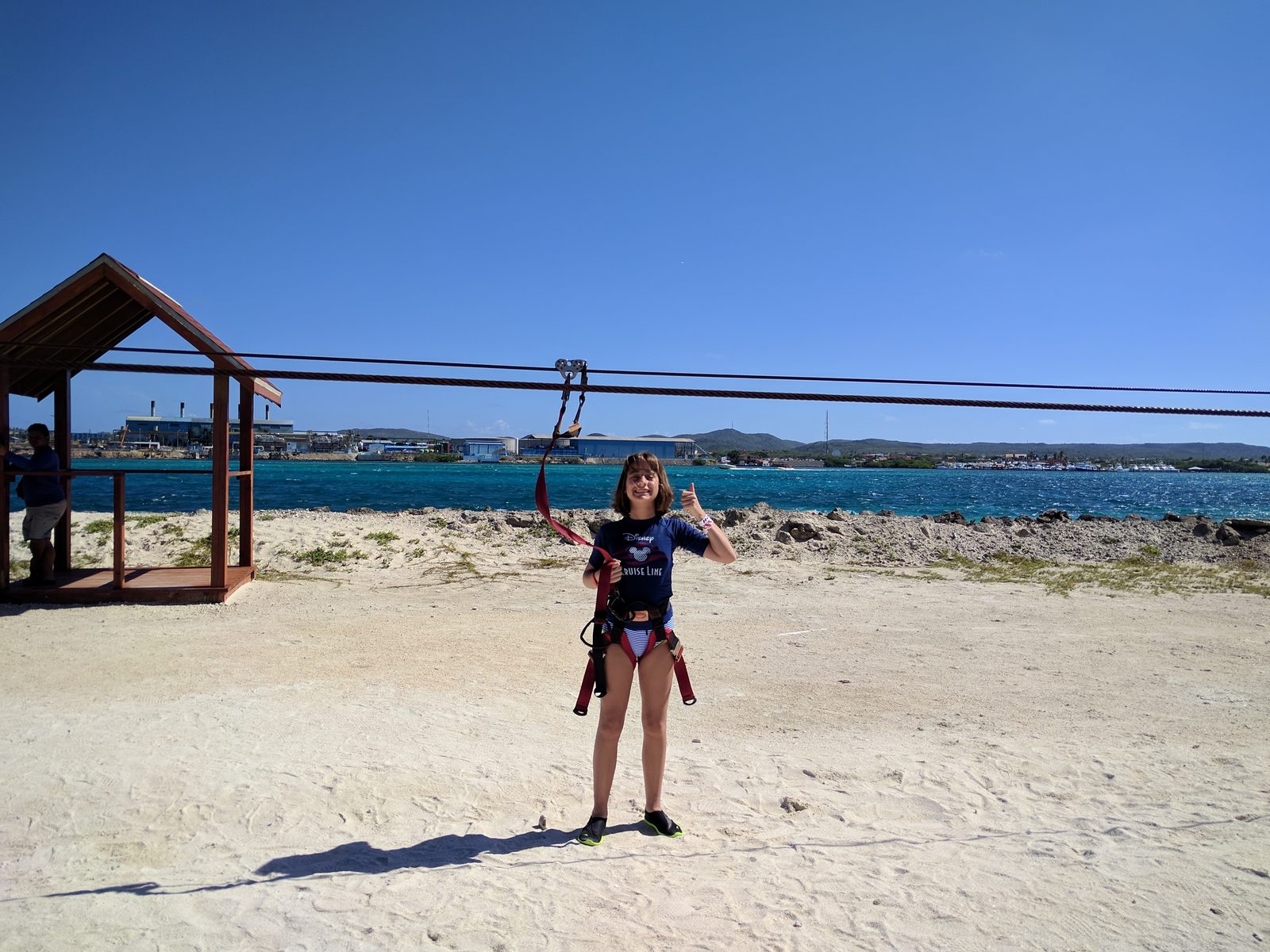 Lisa on the zip line at De Palm Island
