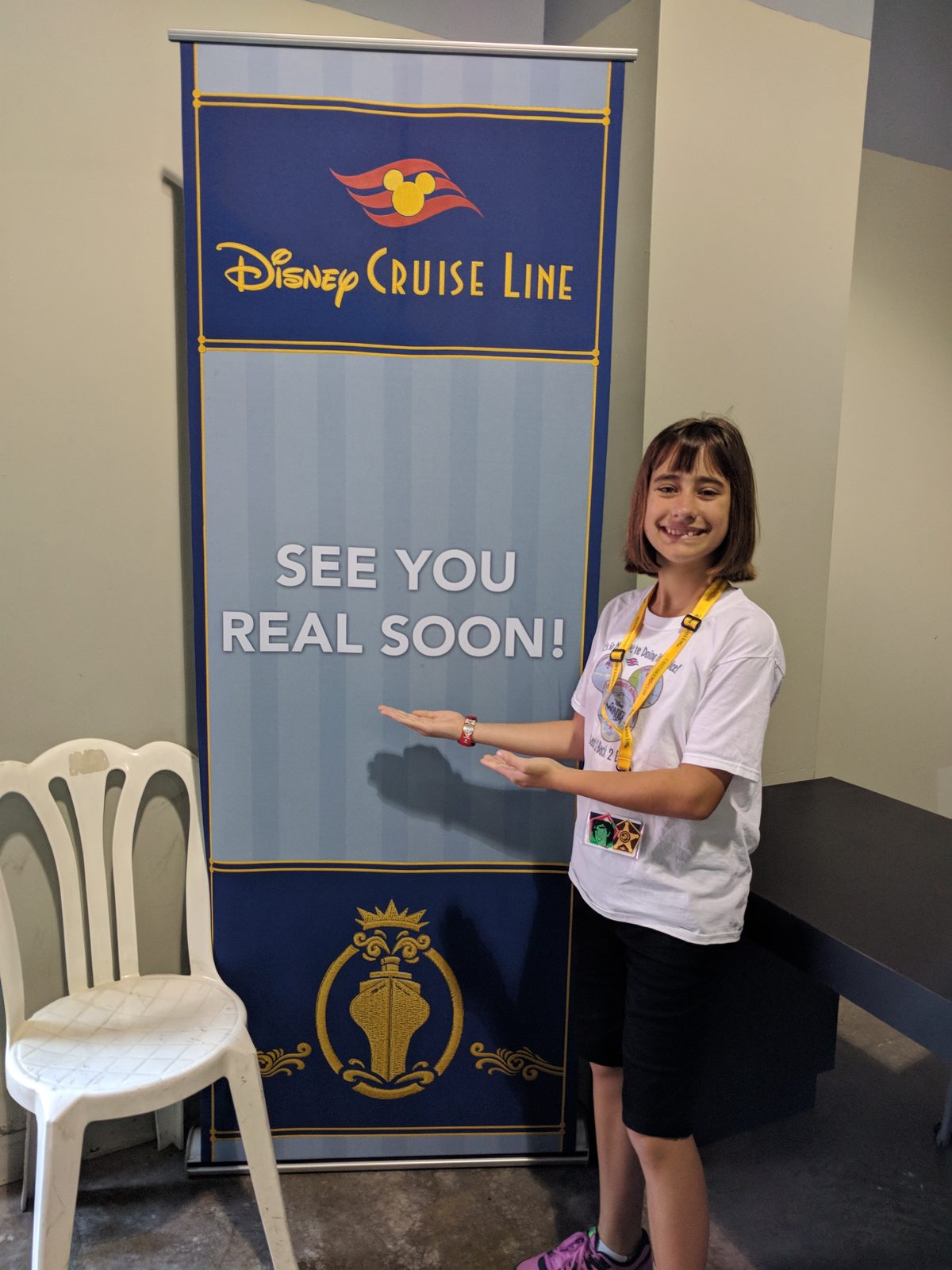 Lisa by the Disney Cruise Line sign