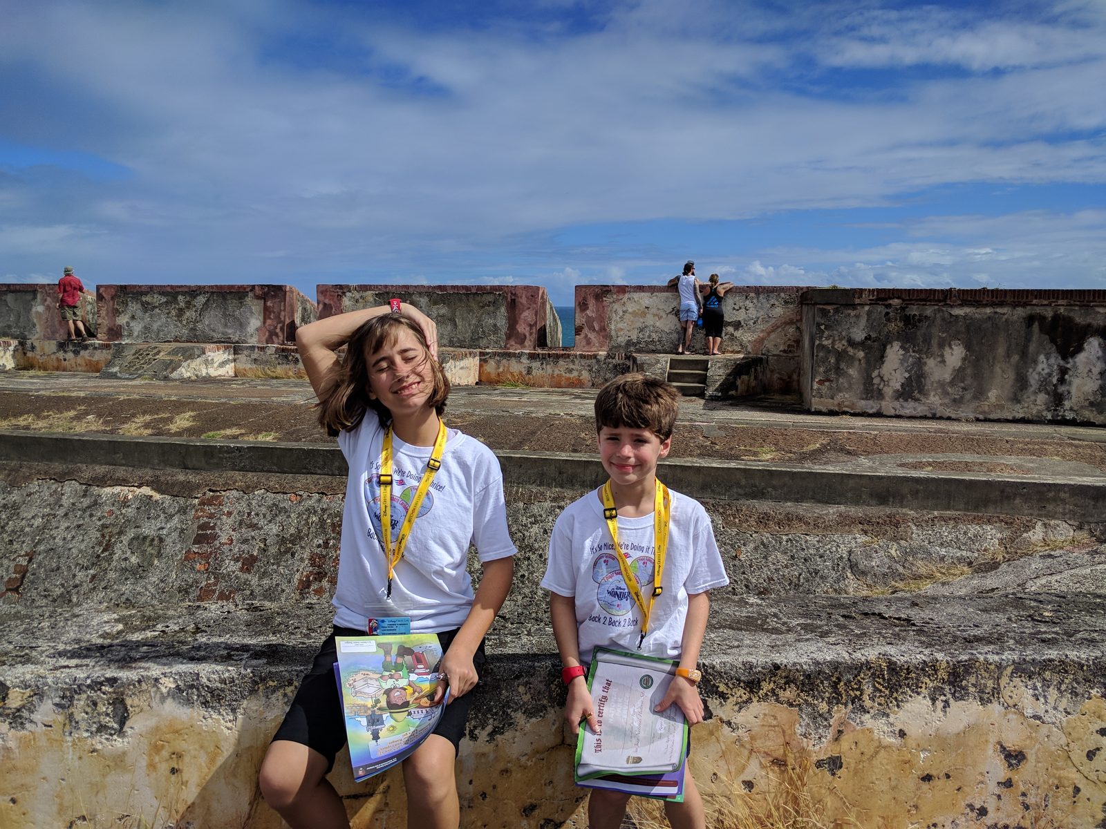 Lisa and Thomas on the fort wall in the wind
