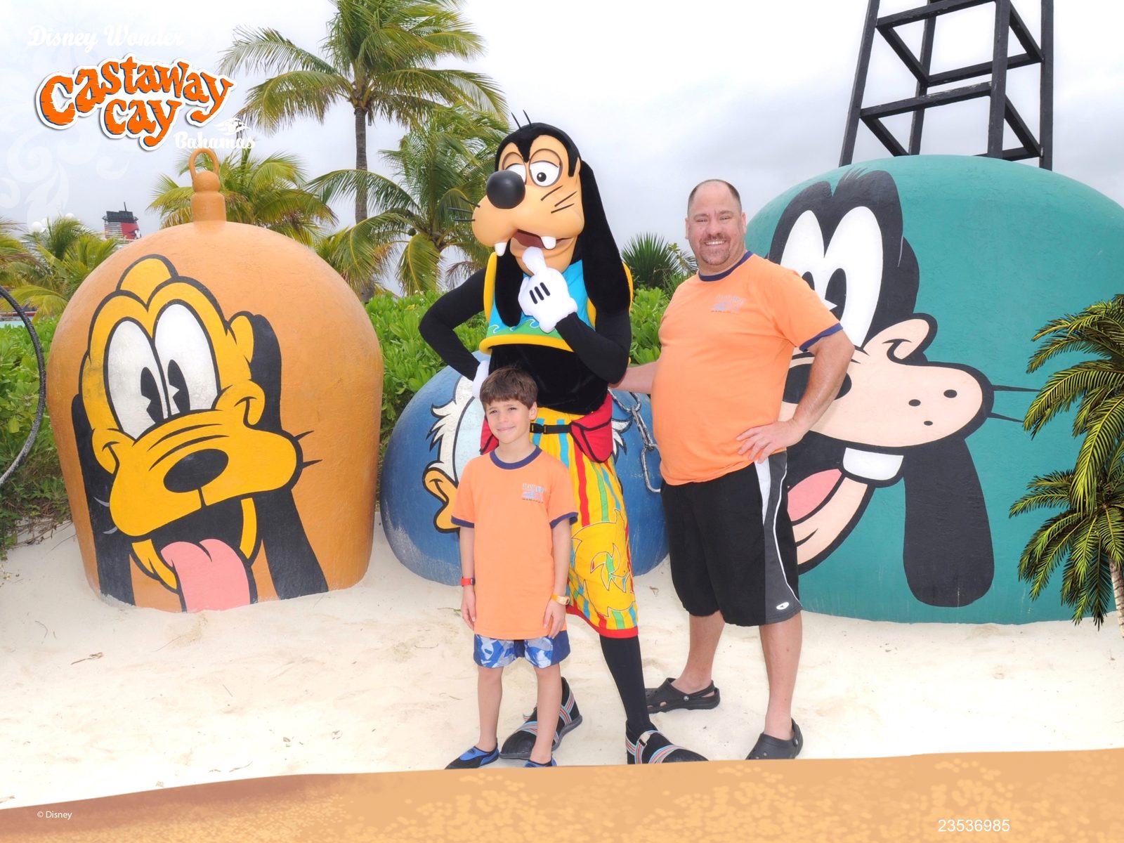 Thomas, Goofy in his Castaway Cay outfit and Michael