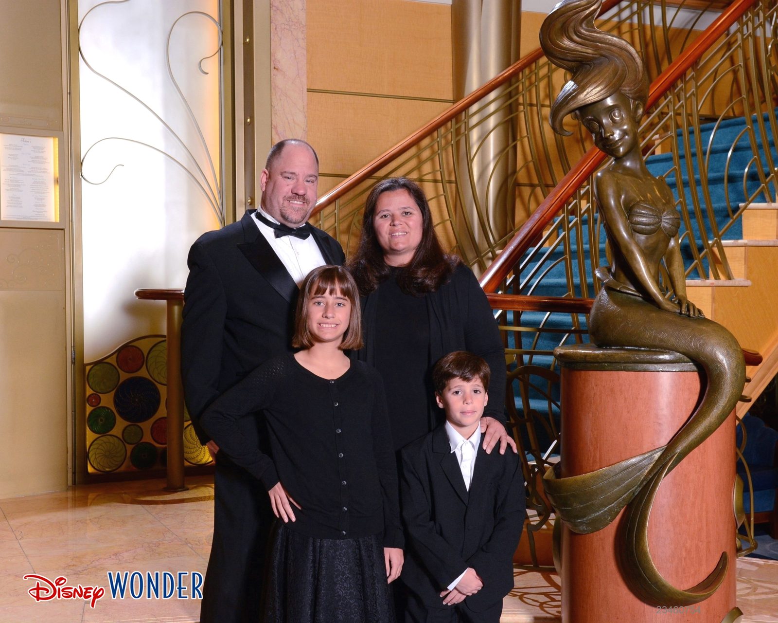Kathy, Lisa, Thomas and me on the stairs for formal night