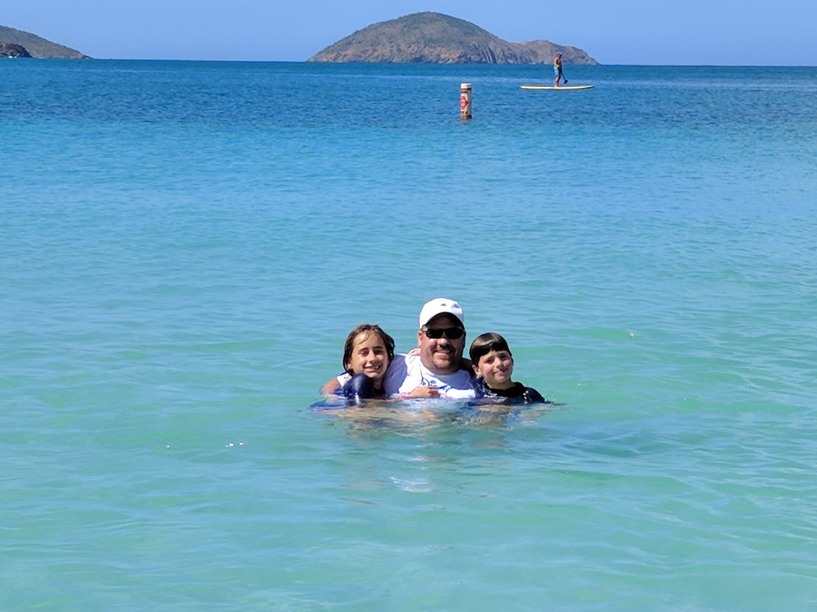 The whole family together in the bay