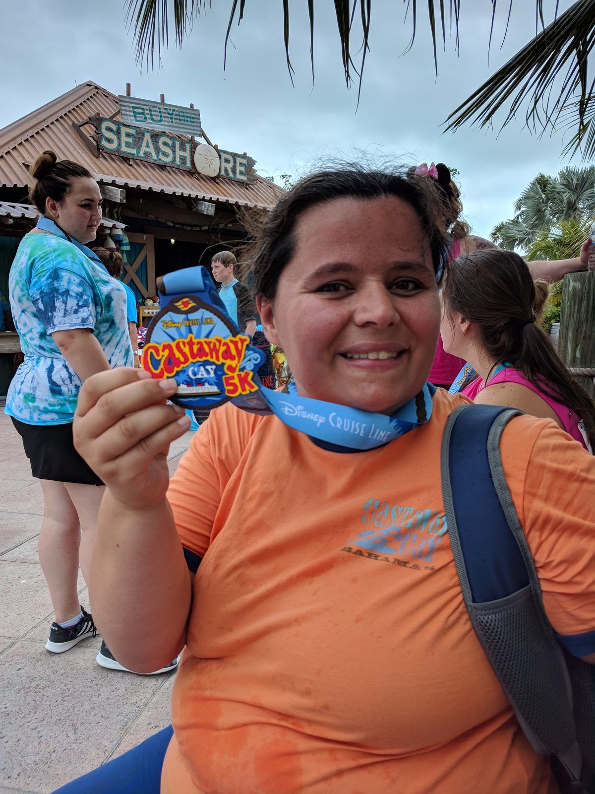 Kathy with her Castaway Cay 5K medal