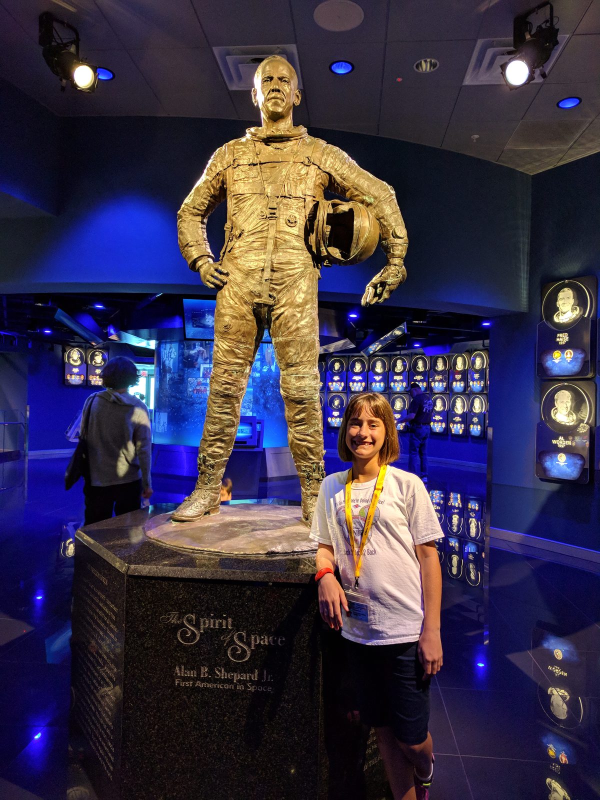 Lisa beside the astronaut statue in the Hall of Fame