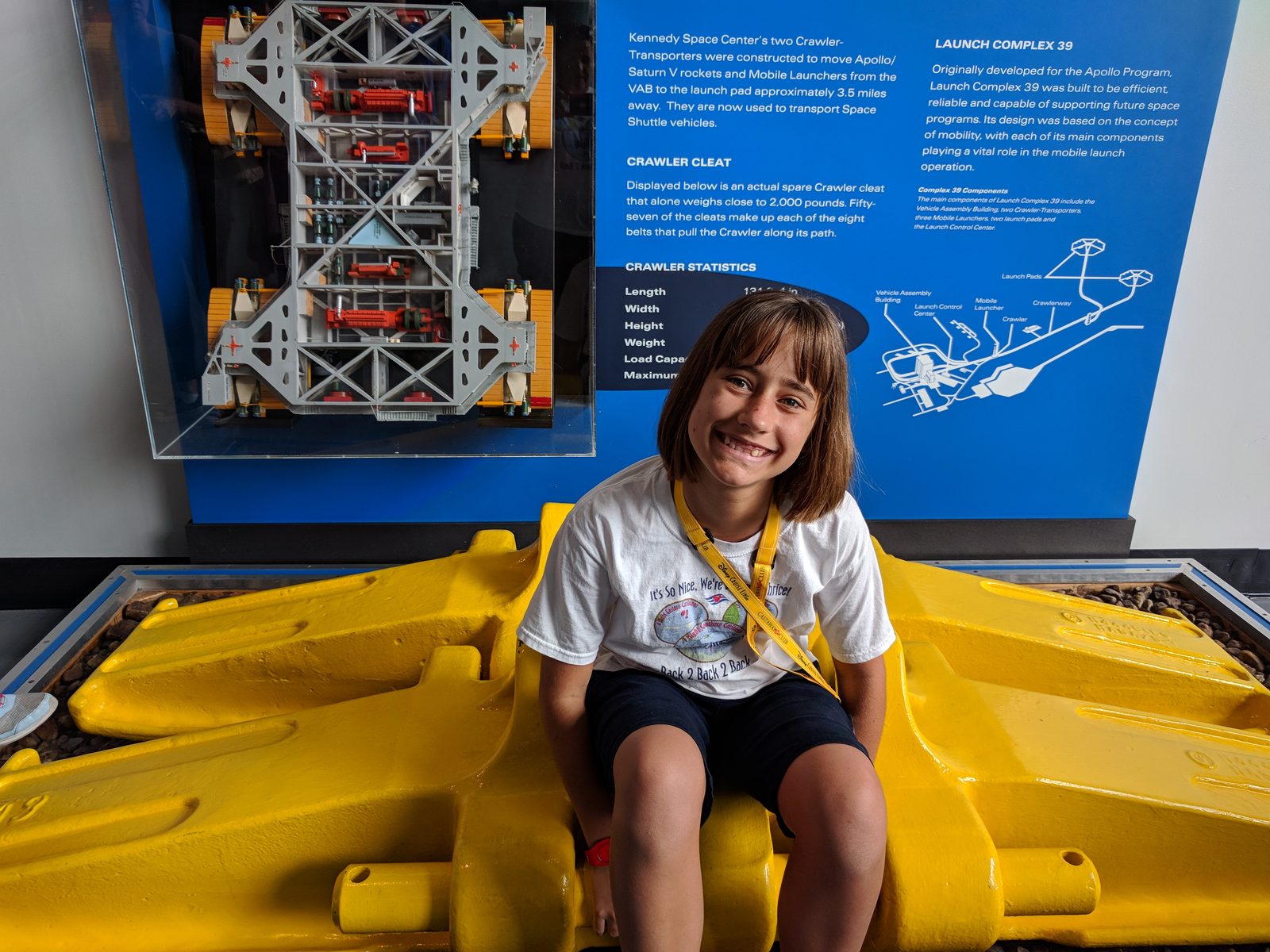 Lisa sitting on the giant crawler treads