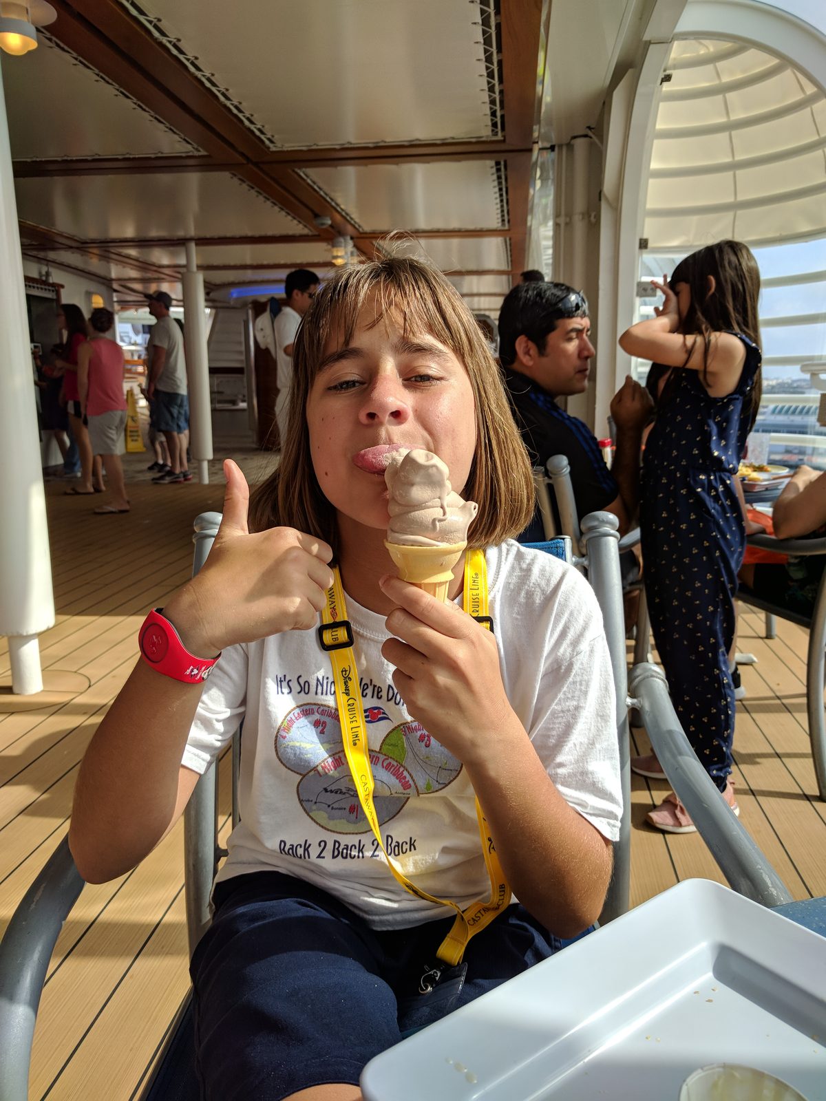 Lisa with an ice cream cone on deck