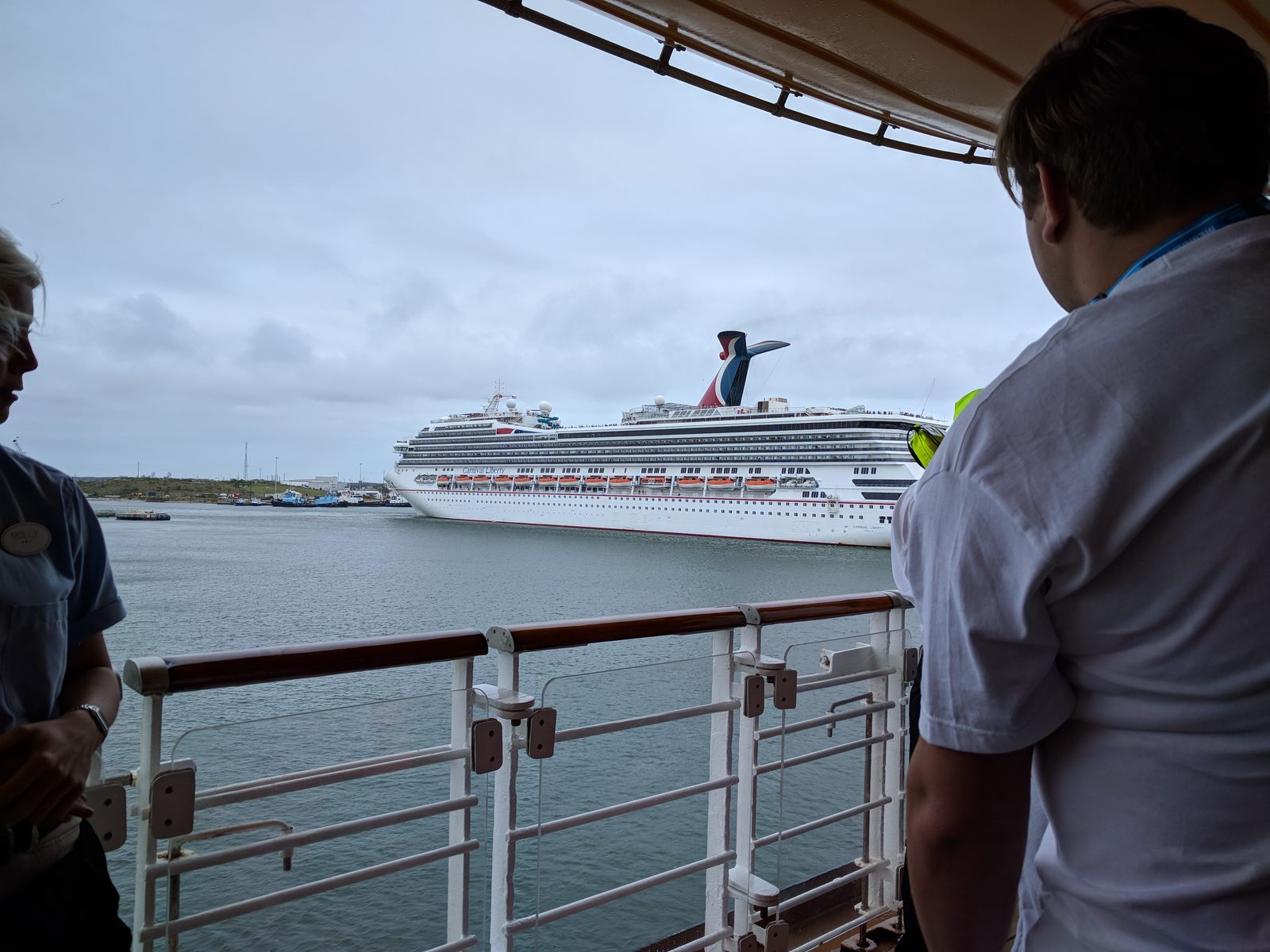 Watching another ship from the rail
