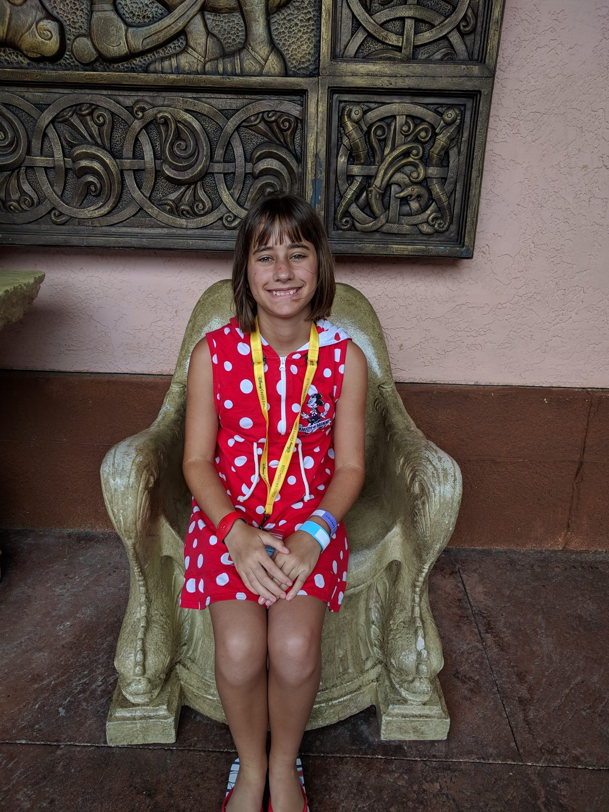 Lisa in a stone chair at Atlantis
