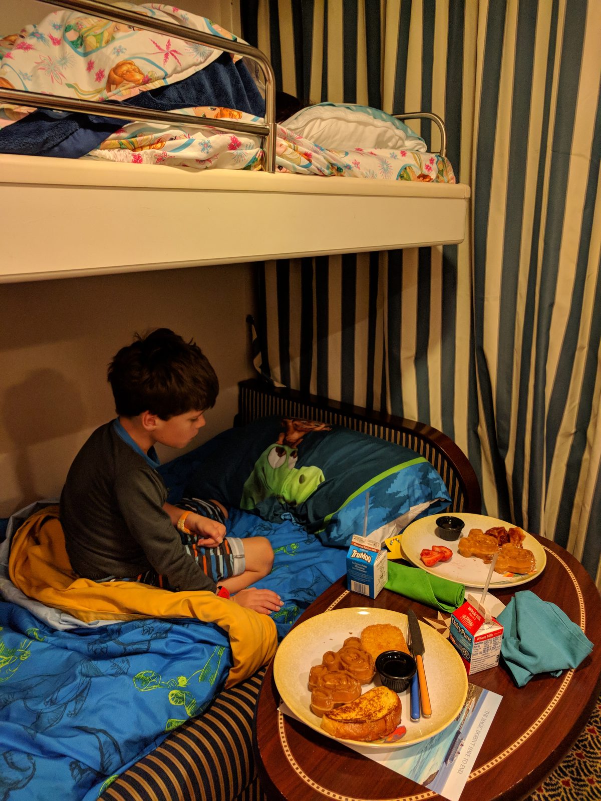 Thomas has breakfast in the bunk bed
