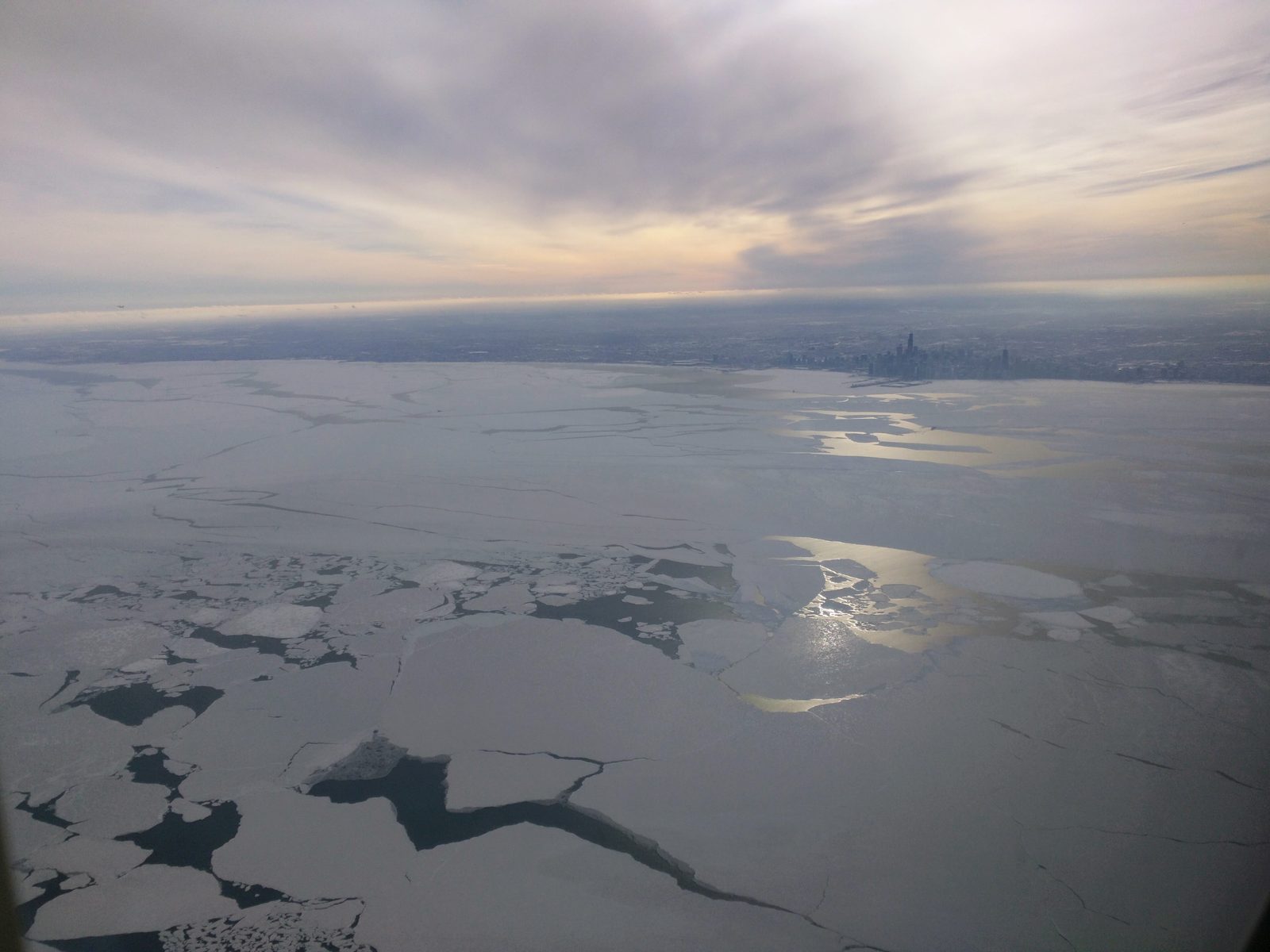 Ice breaking up on Lake Michigan below