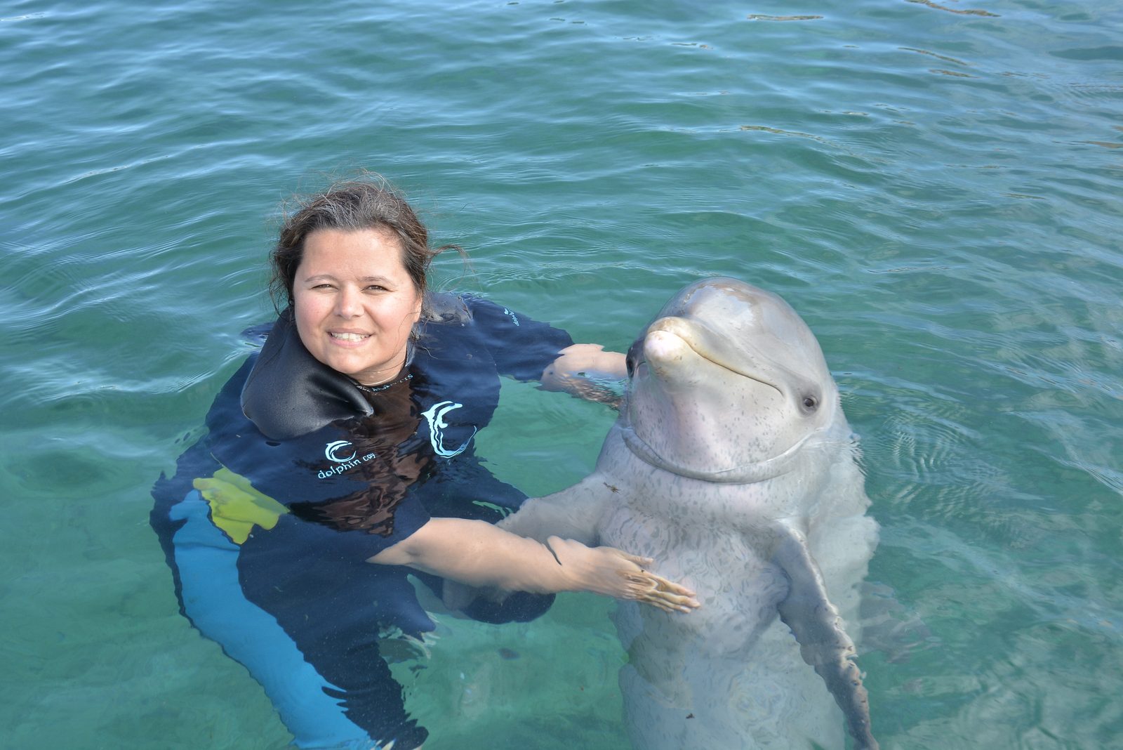 Kathy and her dolphin at Dolphin Cay