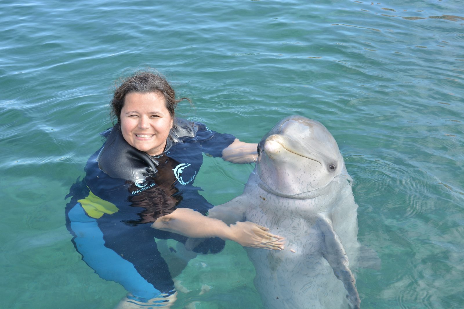 Kathy's turn with the dolphin