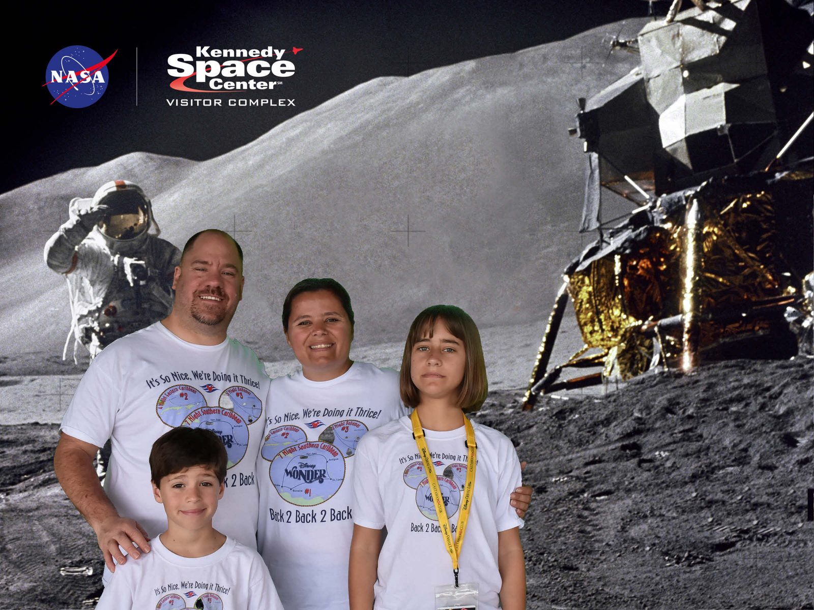 The family beside a real lunar module